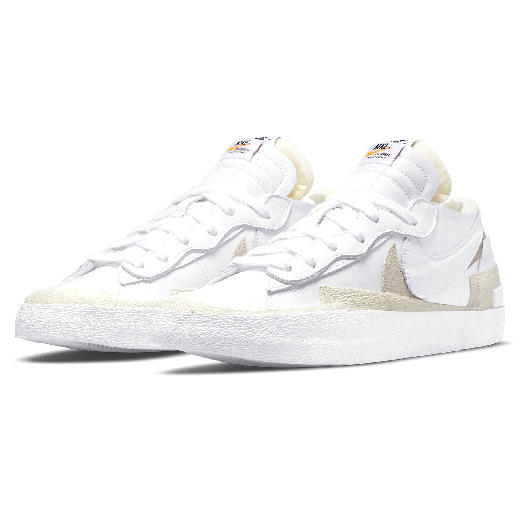 Kaws x sacai x Nike Blazer Low 'White Patent' — Kick Game